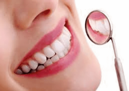 a smiling person with healthy white teeth
